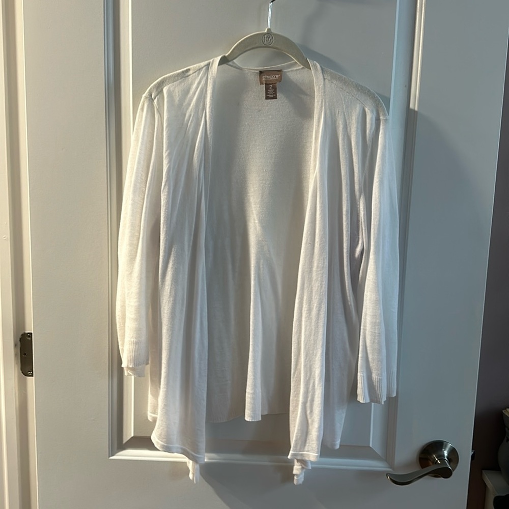 Chicos, very light cardigan, slightly worn size 2, which is a 14 in white,